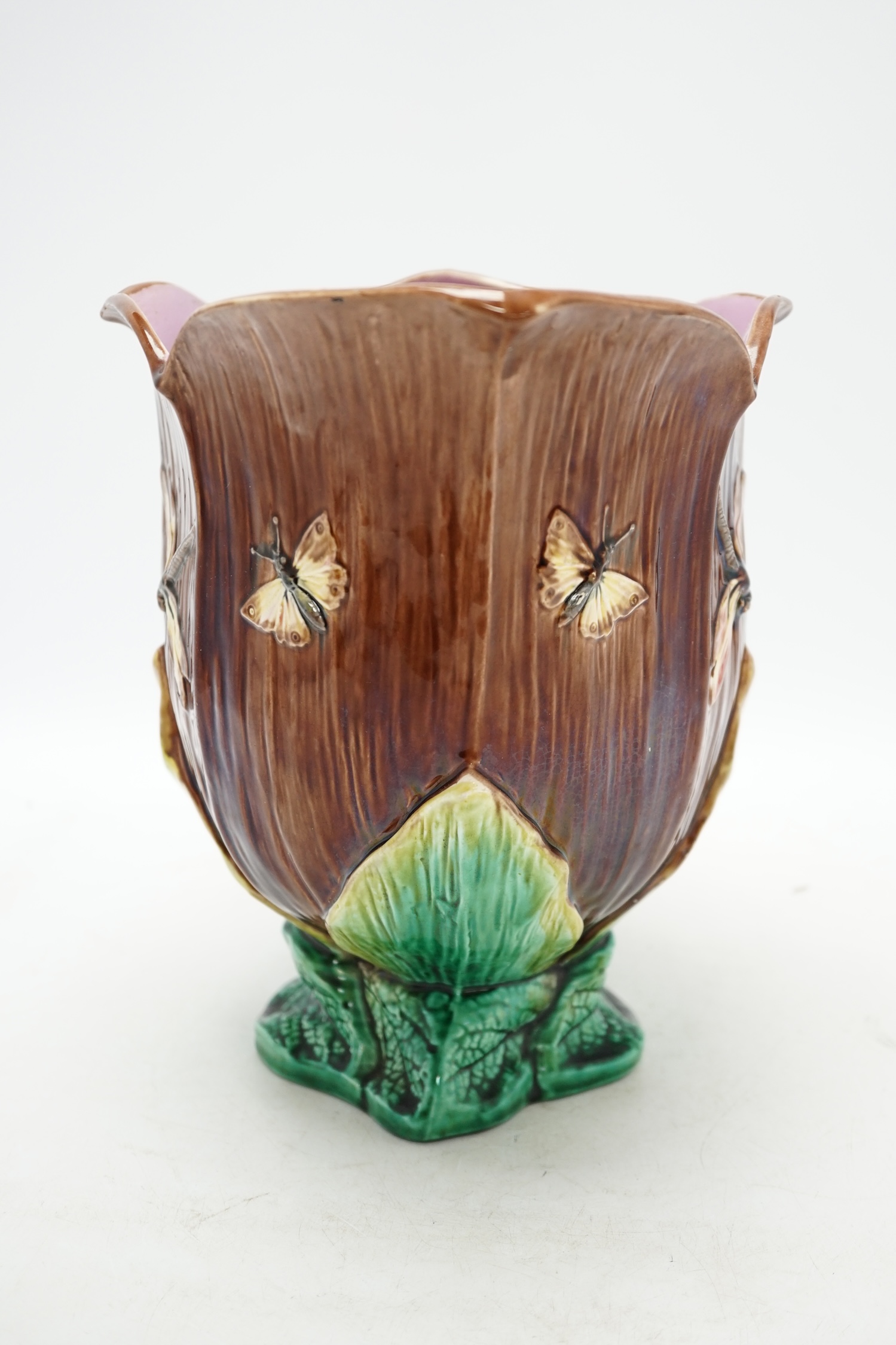 A large Victorian majolica jug, 26cm. Condition - fair